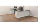 Open kitchen featuring stainless steel appliances and laminate floors at 3270 Maple Ridge Dr, Gastonia, NC 28052