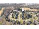 Aerial view of houses in a cul-de-sac neighborhood setting at 4008 Saint Andrews Ct, Cramerton, NC 28032