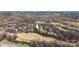 Aerial view of houses in a golf course neighborhood setting at 4008 Saint Andrews Ct, Cramerton, NC 28032