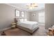 Cozy bedroom with neutral tones, carpet, and ceiling fan at 4008 Saint Andrews Ct, Cramerton, NC 28032