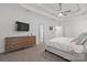 Spacious main bedroom offers carpet floors, a ceiling fan, and access to a large dresser at 4008 Saint Andrews Ct, Cramerton, NC 28032