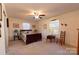 Bright bedroom featuring a ceiling fan, natural light, and quaint decor at 431 Island Cove Rd # 86, Norwood, NC 28128