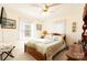 Bedroom with bright natural light, ceiling fan and traditional furniture at 431 Island Cove Rd # 86, Norwood, NC 28128