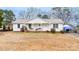 Charming one story home featuring a cozy front porch and well-maintained landscaping on a spacious lot at 431 Island Cove Rd # 86, Norwood, NC 28128
