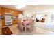 Eat-in kitchen featuring warm wooden cabinets, modern appliances, and an open layout connecting to the living area at 431 Island Cove Rd # 86, Norwood, NC 28128
