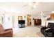 Spacious living room with neutral walls and carpet, complemented by a ceiling fan and ample natural light at 431 Island Cove Rd # 86, Norwood, NC 28128