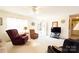 Inviting living room featuring neutral walls and carpet, a ceiling fan, and plenty of natural light from the doorway at 431 Island Cove Rd # 86, Norwood, NC 28128