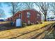 Back exterior view of the brick home with small windows at 510 W 15Th St, Newton, NC 28658