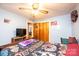 Bedroom with hardwood floors, ceiling fan, and closet at 510 W 15Th St, Newton, NC 28658