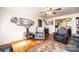 View of the Living Room with hard wood floors, ceiling fan, and furniture at 510 W 15Th St, Newton, NC 28658