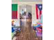 View of the living room with hardwood floors and archway at 642 E Black St, Rock Hill, SC 29730