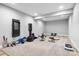 Home gym in basement featuring work out equipment and carpet at 7191 Grist Mill Ct, Denver, NC 28037
