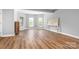 Large bedroom featuring hardwood floors and bright windows at 7191 Grist Mill Ct, Denver, NC 28037