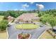 Beautiful clubhouse and manicured landscaping offers a prime location for community gatherings and recreation at 7191 Grist Mill Ct, Denver, NC 28037