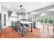 Open kitchen with a large island, pendant lighting, and stainless steel appliances at 7191 Grist Mill Ct, Denver, NC 28037