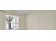Bright bedroom featuring a window with blinds and an empty room at 7203 Shenandoah Dr, Fort Mill, SC 29707