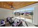 Inviting sun room with wood ceiling, ceiling fan and large sliding windows offering a scenic backyard view at 7203 Shenandoah Dr, Fort Mill, SC 29707