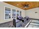 Inviting sun room with wood ceiling, ceiling fan and multiple windows offering a scenic view at 7203 Shenandoah Dr, Fort Mill, SC 29707