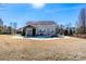 Enjoy a private backyard oasis with a sparkling pool, perfect for relaxing and entertaining guests in style at 8471 Penton Pl, Harrisburg, NC 28075