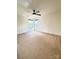 Spacious bedroom featuring neutral walls, carpet flooring, windows for ample natural light, and a ceiling fan at 8471 Penton Pl, Harrisburg, NC 28075