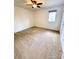 Bedroom featuring neutral walls, carpet flooring, a window for natural light, and a ceiling fan at 8471 Penton Pl, Harrisburg, NC 28075
