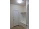 Practical mudroom with a built-in bench and coat hooks, perfect for organizing outdoor gear at 8471 Penton Pl, Harrisburg, NC 28075