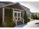 Rear exterior view of screened in patio featuring steps down to the yard at 8471 Penton Pl, Harrisburg, NC 28075