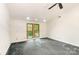 Bedroom featuring gray carpet, neutral paint, and a track lighting system at 1006 Lost Cv, Weddington, NC 28104