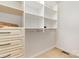 Walk-in closet with custom cabinets and plenty of storage space at 1006 Lost Cv, Weddington, NC 28104