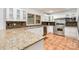 Spacious kitchen featuring stainless steel appliances, a granite countertop, and stylish backsplash at 1006 Lost Cv, Weddington, NC 28104