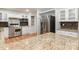 Spacious kitchen with a large island, granite countertops, and stainless steel appliances at 1006 Lost Cv, Weddington, NC 28104