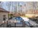 Backyard view from deck shows large in-ground pool, gazebo, and plenty of privacy at 1006 Lost Cv, Weddington, NC 28104