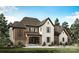 Beautiful two-story home with a stone foundation, wood accents, and a welcoming front porch at 105 Redbird Ln, Weddington, NC 28104
