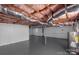 Large basement with visible ductwork and pink insulation; ready for personalized finishing at 1110 Alexander St, Statesville, NC 28677