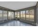 Sun room with large sliding glass doors to backyard at 1110 Alexander St, Statesville, NC 28677