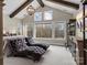 Spacious main bedroom featuring vaulted ceiling with exposed beams and lots of natural light at 1238 Ladera Dr, Waxhaw, NC 28173