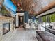 Spacious open floor plan with hardwood ceiling, fireplace, living room, kitchen and backyard views at 1238 Ladera Dr, Waxhaw, NC 28173
