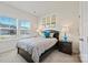 Cozy bedroom with a neutral color scheme, a plush bed, and ample natural light at 1332 Augustus Beamon Dr, Indian Trail, NC 28079
