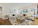Spacious living room with two sofas, an ottoman, and tasteful decor at 1332 Augustus Beamon Dr, Indian Trail, NC 28079
