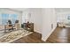Bright office with a desk, shelving, and a stylish geometric area rug at 1332 Augustus Beamon Dr, Indian Trail, NC 28079