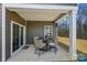 Covered patio with outdoor seating at 1332 Augustus Beamon Dr, Indian Trail, NC 28079