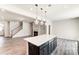 Kitchen with a large island, stainless steel appliances, and open layout at 14726 Tamarack Dr, Charlotte, NC 28278