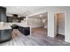 Contemporary kitchen with stainless steel appliances, an island, and seamless flow into living spaces at 14726 Tamarack Dr, Charlotte, NC 28278