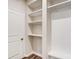 Mudroom featuring built-in shelving and a coat rack at 14726 Tamarack Dr, Charlotte, NC 28278