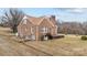 Charming brick home featuring a classic design and beautiful surroundings at 1489 Riley St, Albemarle, NC 28001