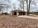 View of a single-Gathering home featuring a covered back porch in a mature neighborhood at 1936 Russell Ave, Charlotte, NC 28216