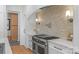 Gourmet kitchen featuring stainless steel appliances, a pot filler, and white countertops at 2013 Gladelynn Ct # 354, Belmont, NC 28012