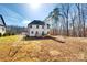 Exterior of the home with a large backyard, deck and soccer goals at 2143 Country Club Rd, Lincolnton, NC 28092