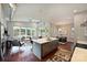 Spacious living space featuring open kitchen, dining, and living areas with lots of natural light at 3126 Creighton Dr, Charlotte, NC 28205