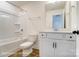 Clean bathroom features a shower-tub combo, toilet, and vanity with modern finishes and a stylish mirror at 3213 Mcharney Dr # 32, Harrisburg, NC 28075